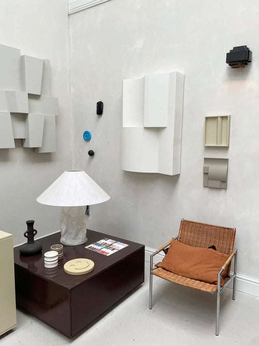 ELEMENT BRUTALIST artwork made from biodegradable PLA with structured plaster finish, featuring a Shadow White design in a modern interior setting.