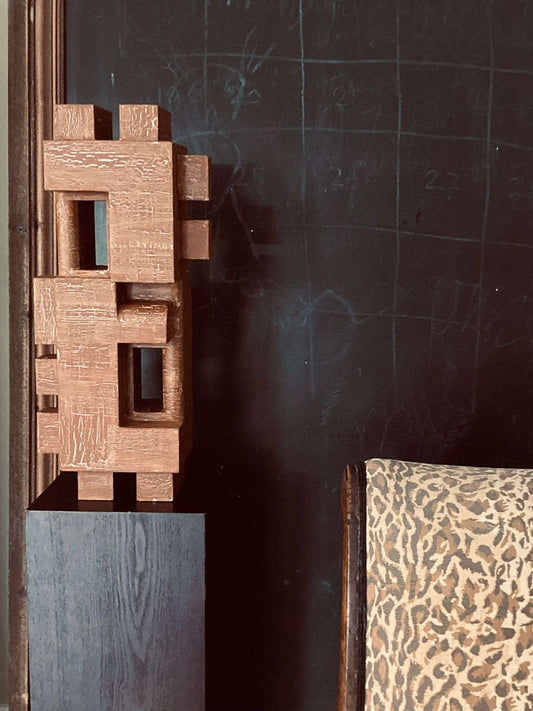 Large 'Odile' wall sculpture with crackle finish in organic form, inspired by architectural elegance.