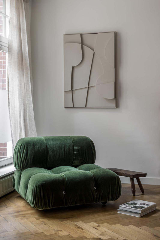 Eco-friendly art piece with sand texture finish displayed in modern interior.