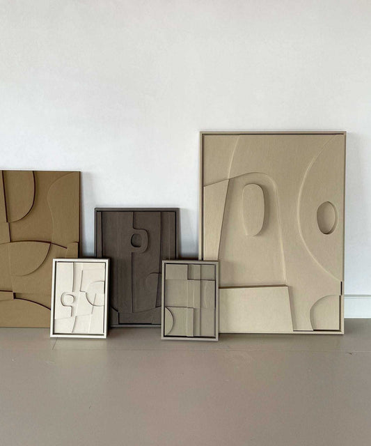 Artworks made of biodegradable PLA with sand texture and eco-paint, titled "#20.3 Moon," featuring unique abstract designs.