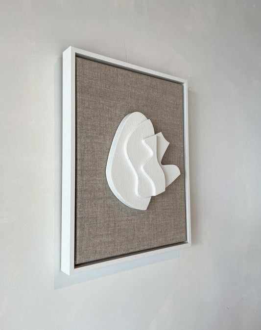 Canvas Solida artwork with shadow white frame, textured plaster surface, and canvas background.