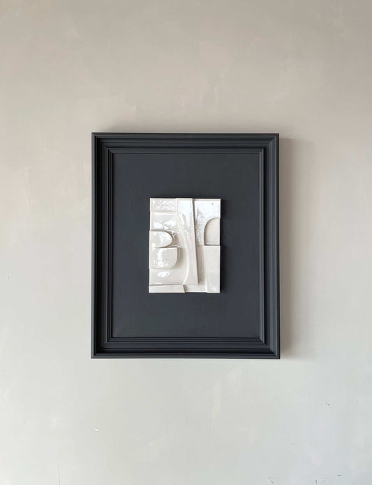 Vintage Frame Alphie with shiny white artwork and anthracite frame, 59.5 x 49.5 cm, by Edith Beurskens.