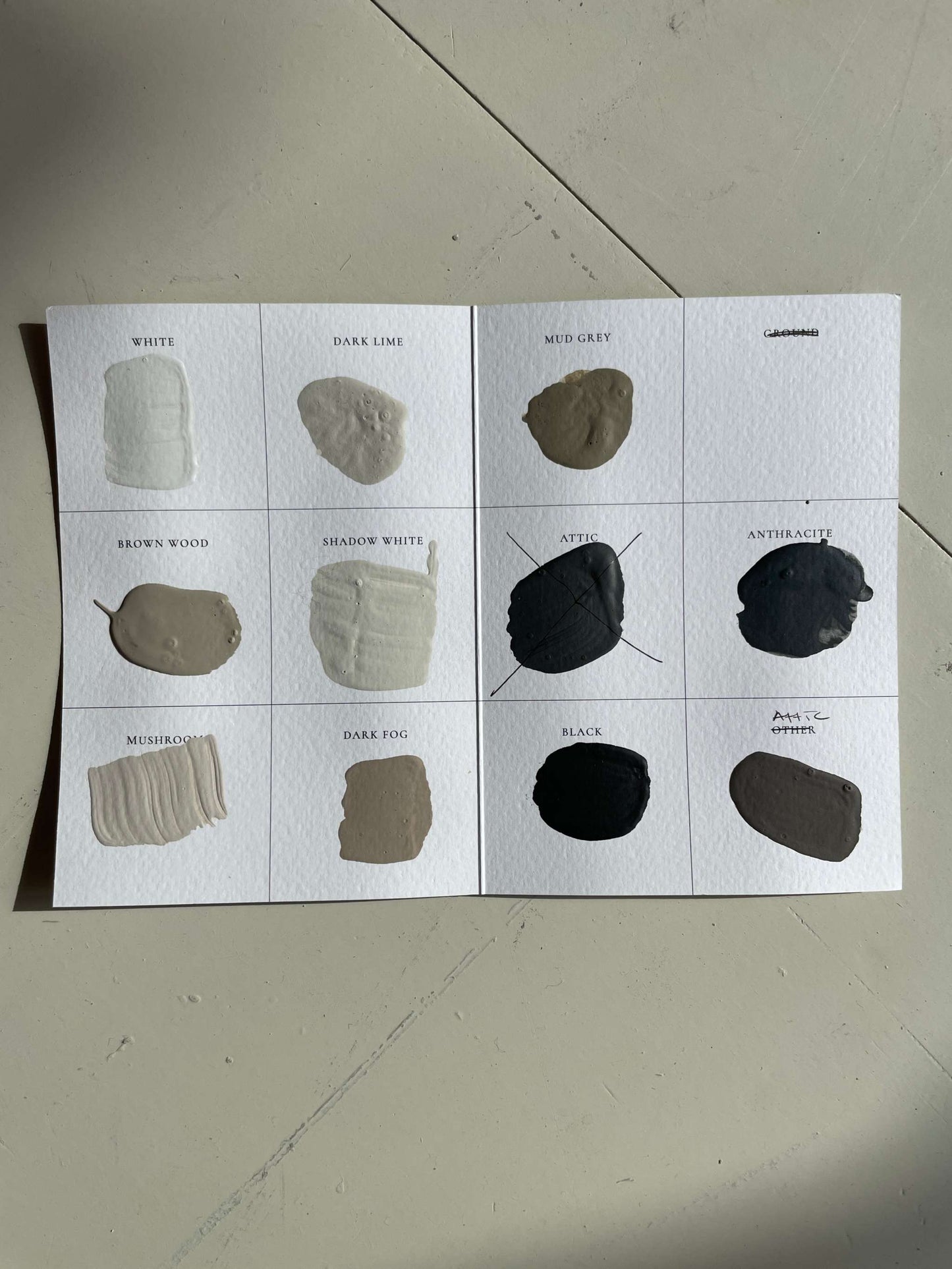 Art color swatch card with various shades including white, dark lime, red grey, and black, suitable for customizing hand-made PLA artworks.