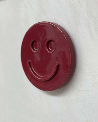 Burgundy HAPPY ceramic artwork, handmade smile design by Edith Beurskens, perfect gift.