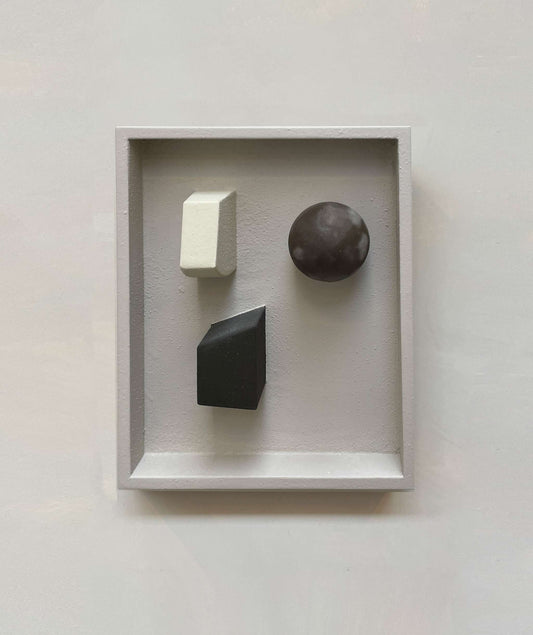 Playland Blocks artwork in a frame with geometric shapes made from plant-based PLA, featuring eco-paint and resin finish.