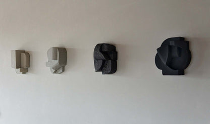 Helene wall sculpture with hand-painted finish in organic form.