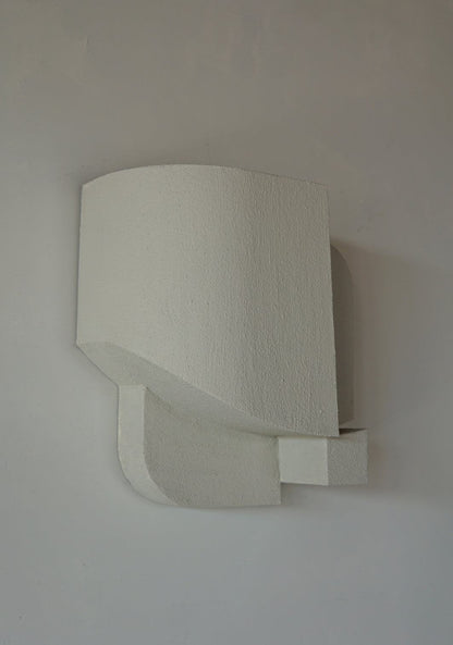 "Helene" wall sculpture in sand finish, organic form, hand-painted, inspired by architectural history.