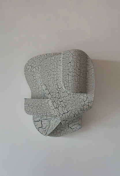 Wall sculpture with crackle finish and organic form, size L: 30 cm W: 24.5 cm H: 14.9 cm.