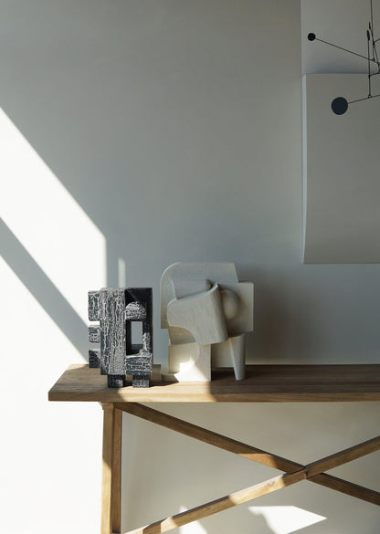 Odile Sculpture Crackle on wooden table, showcasing organic form and hand-painted finish.