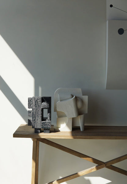 Odile Sculpture (Crackle) with unique hand-painted finish on display.