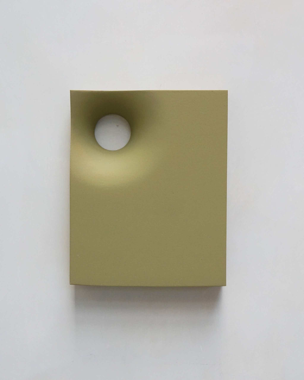 Green artwork from the PLAY collection, featuring a distinctive peephole design, eco-painted and resin-finished.