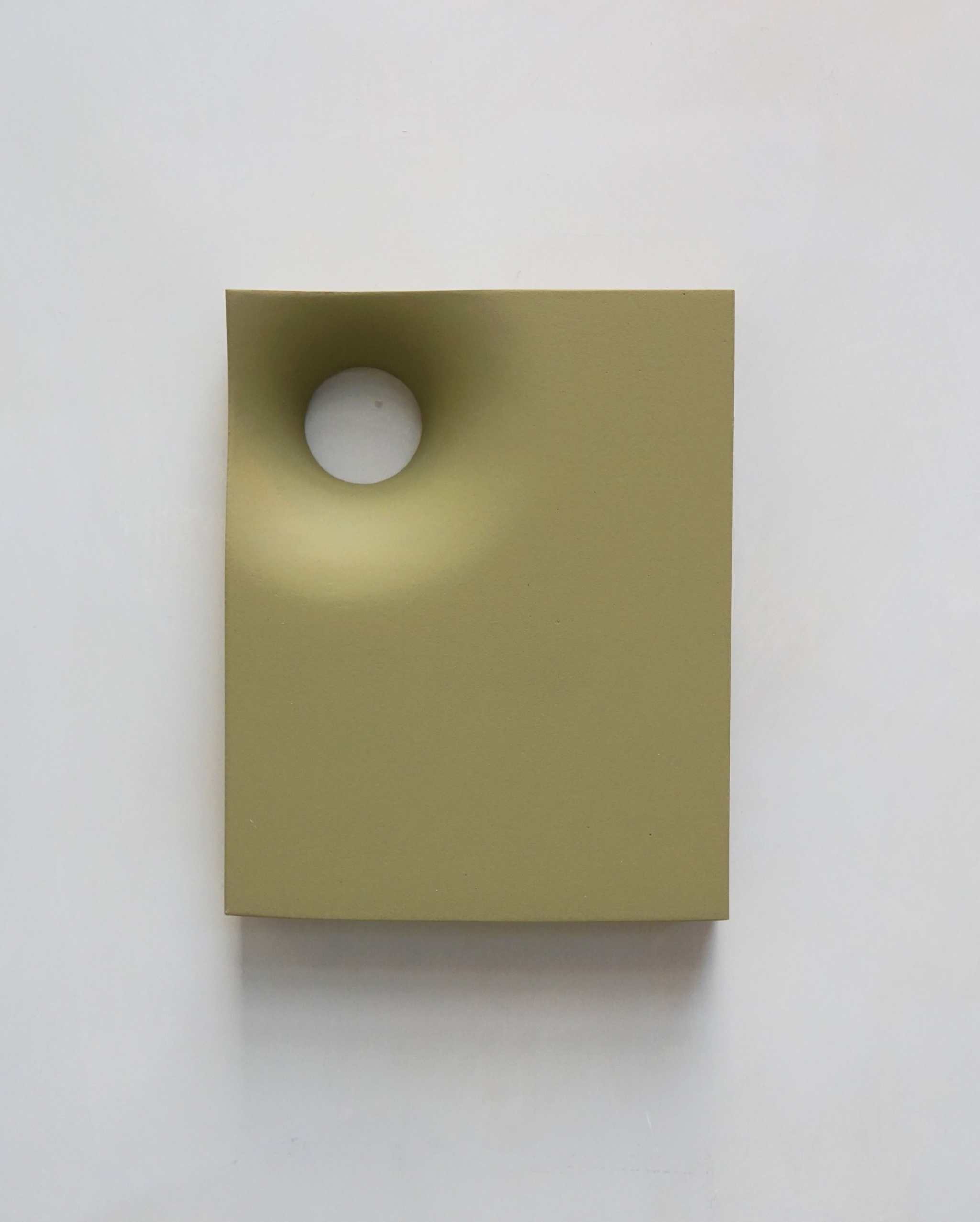 Green artwork from the PLAY collection, featuring a distinctive peephole design, eco-painted and resin-finished.