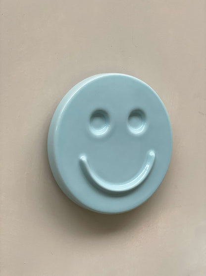 Sky Blue ceramic artwork with HAPPY face design