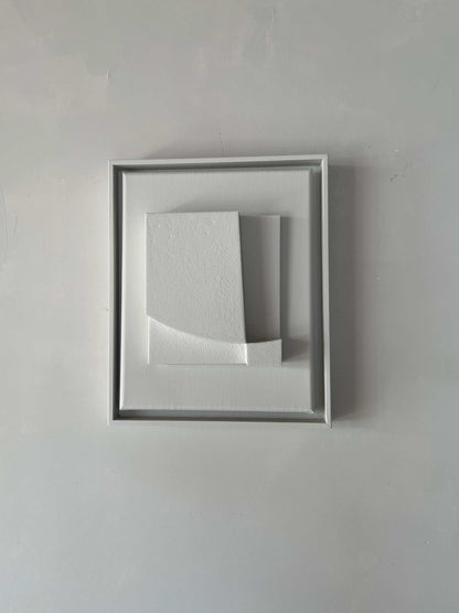 Canvas Level artwork with biodegradable PLA base, Shadow White frame, and structured plaster finish.