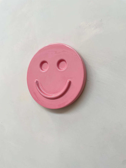 Pink HAPPY ceramic artwork wall decor by Edith Beurskens, handcrafted and glazed.