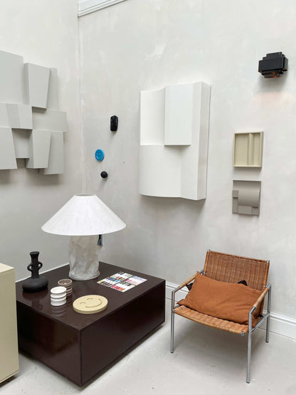 ELEMENT BRUTALIST artwork made from biodegradable PLA with structured plaster finish, featuring a Shadow White design in a modern interior setting.