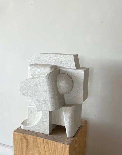 Mien Sculpture in Crackle finish on display, featuring organic forms and cubist design.