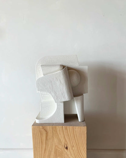 Large 'Mien' sculpture with organic form, hand-painted crackle finish, honoring female pioneers.