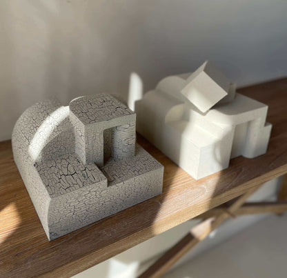 Erica Sculpture in sand finish with unique hand-painted design, showcasing organic architectural form, by Ilse van Stoltz and Edith Beurskens.