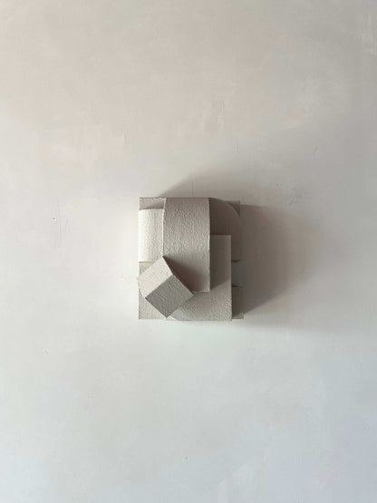 Erica Sculpture Sand with organic form and unique hand-painted finish.