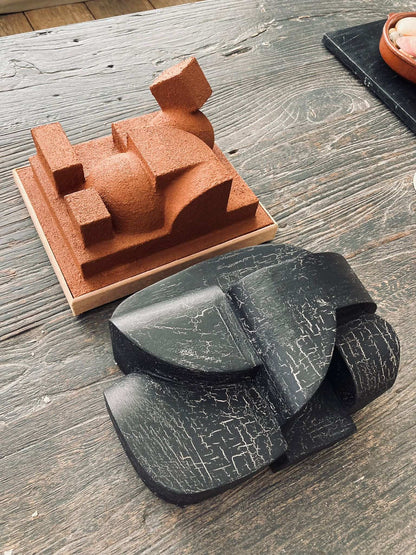 Organic 'Charlotte' sculpture with hand-painted finish, inspired by architectural forms.