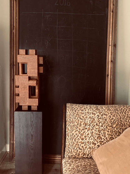 Odile large crackle sculpture with hand-painted finish displayed indoors.