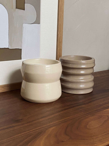 Chalk Shape 02.01 ceramic candle holders from the Scented Candles Shapes Collection, handcrafted by Royal Goedewaagen and Edith Beurskens, displayed on a wooden surface.