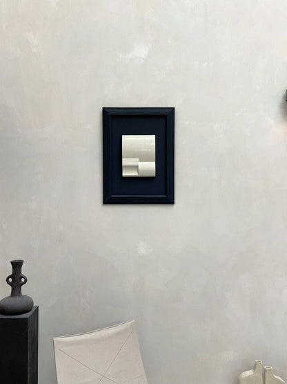 Vintage Frame Nova with exclusive artwork by Edith Beurskens, featuring a black vintage frame and gloss off-white artwork, displayed on a wall.