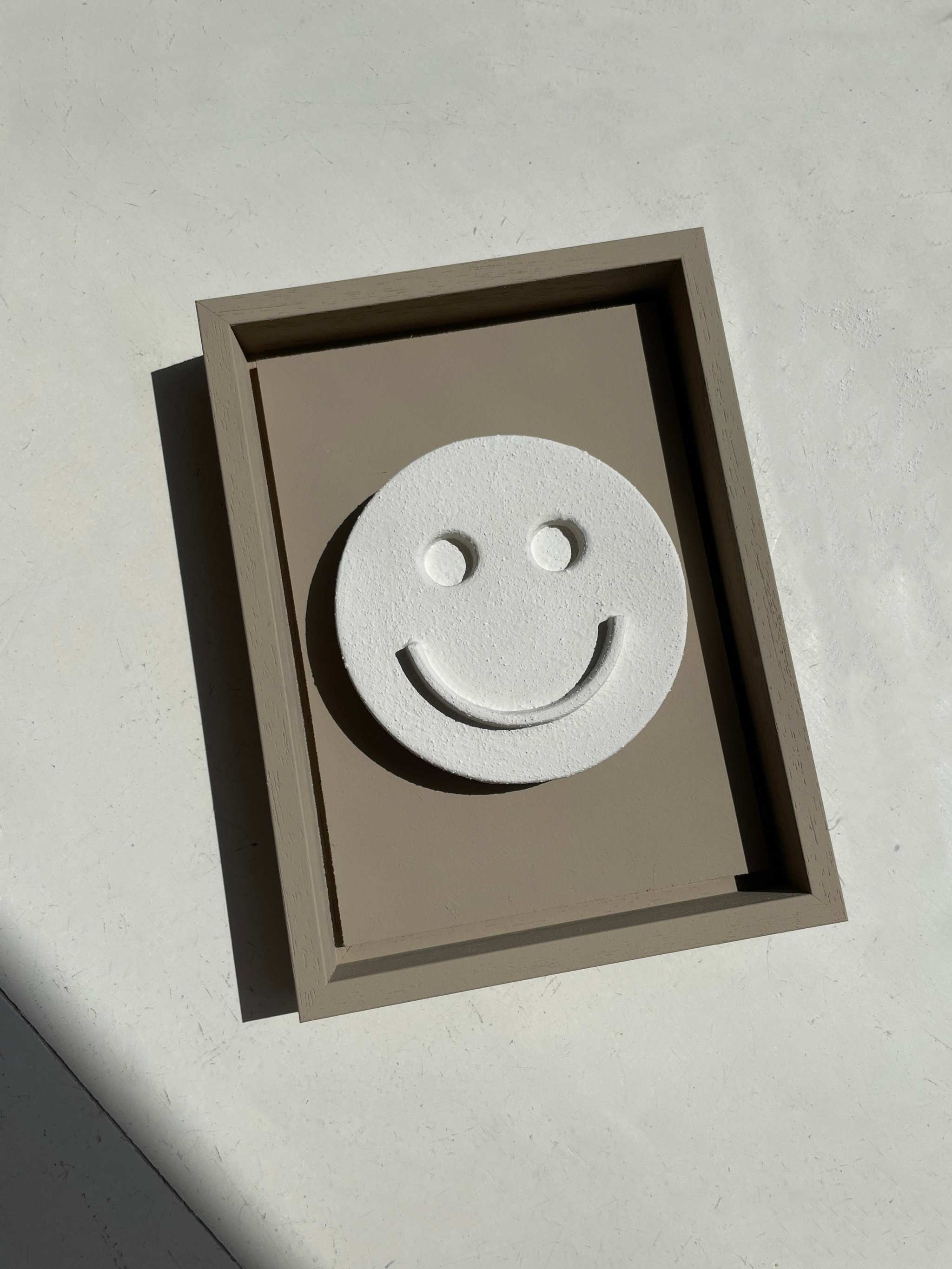 23.5 Happy eco-friendly handmade artwork in sand texture frame.