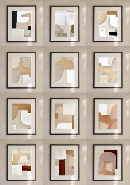 Boaz art print collection displayed in frames on a wall.