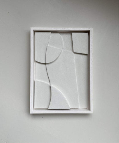 Handmade abstract art piece '#21.21 Charlie' framed in white with textured surface.