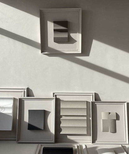 Vintage Frame 22.03 featuring exclusive artwork by Edith Beurskens, made from eco-friendly materials, displayed in a collection on a wall.