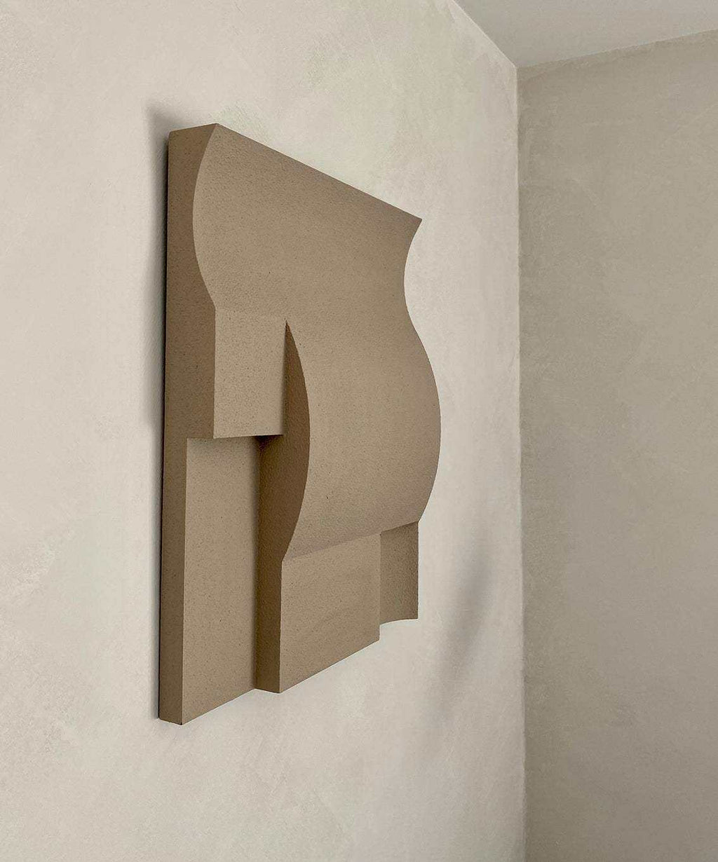 Modern art wall sculpture made from plant-based PLA, featuring a geometric design with sand texture and eco-paint finish.