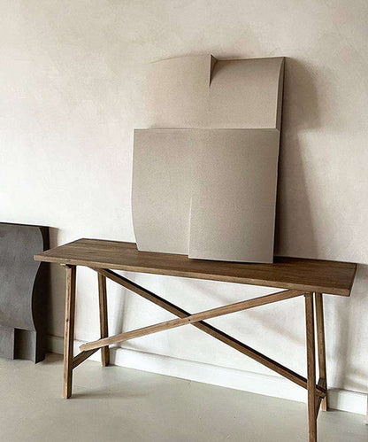 Modern art piece titled '#22.10 Journey' with a sand-textured finish, displayed on a wooden table.