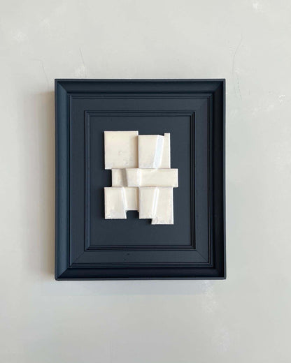 Vintage Frame Dee with exclusive artwork by Edith Beurskens, matte anthracite and shiny off-white, plant-based PLA material.