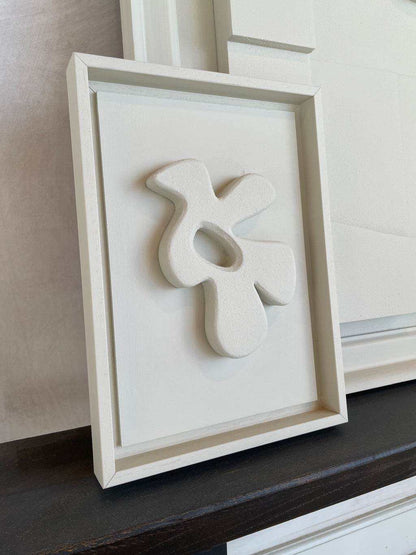 Abstract bird artwork made from PLA with sand texture and eco-paint in a white frame.
