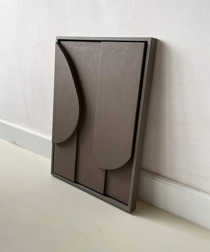 Handmade geometric wall art in biodegradable PLA with sand texture finish.