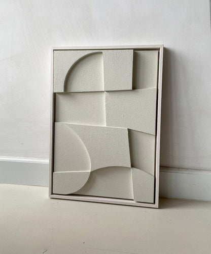 Abstract art piece with geometric shapes made from biodegradable PLA, featuring a sand-textured surface and eco-paint.