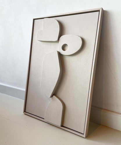 Biodegradable PLA art with sand texture in frame, eco-friendly materials.