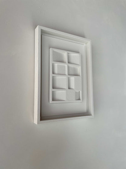 Wall artwork made from biodegradable PLA with sand texture and eco-paint, titled "23.3 Pella".