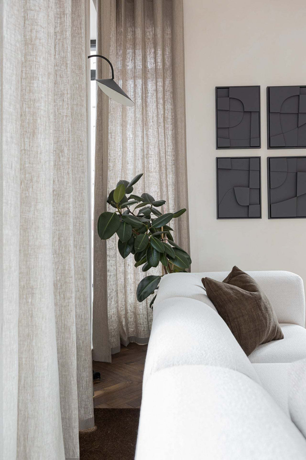 Quartet - Tête à Tête handcrafted biodegradable wall art with sand texture and eco-paint, displayed in modern interior.