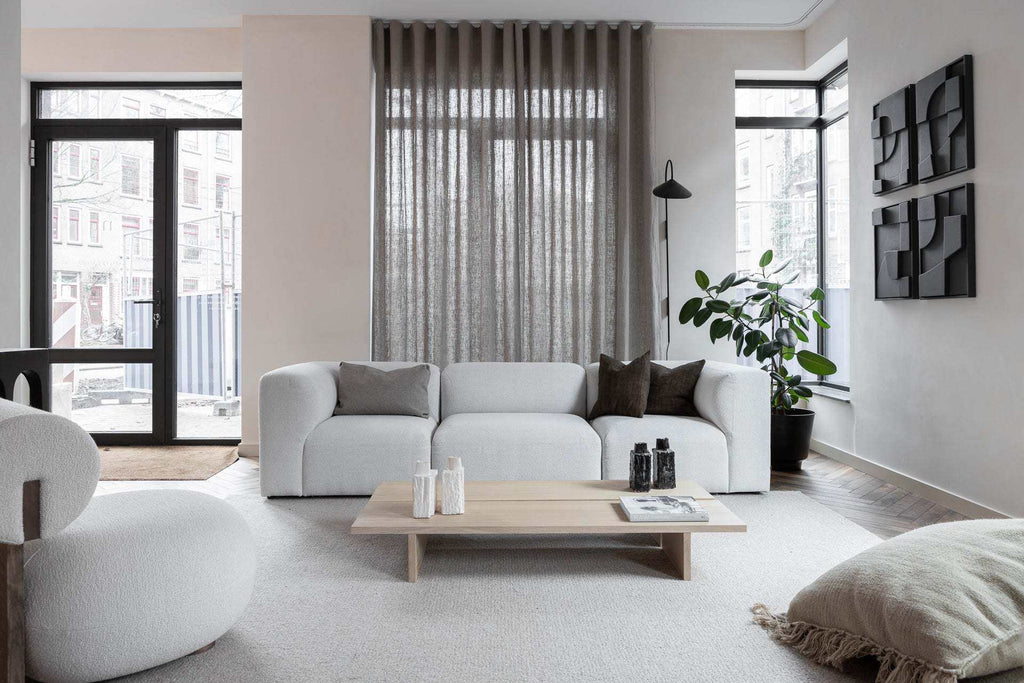 Modern living room featuring 'Quartet - Tête à Tête' artwork with eco-friendly design.