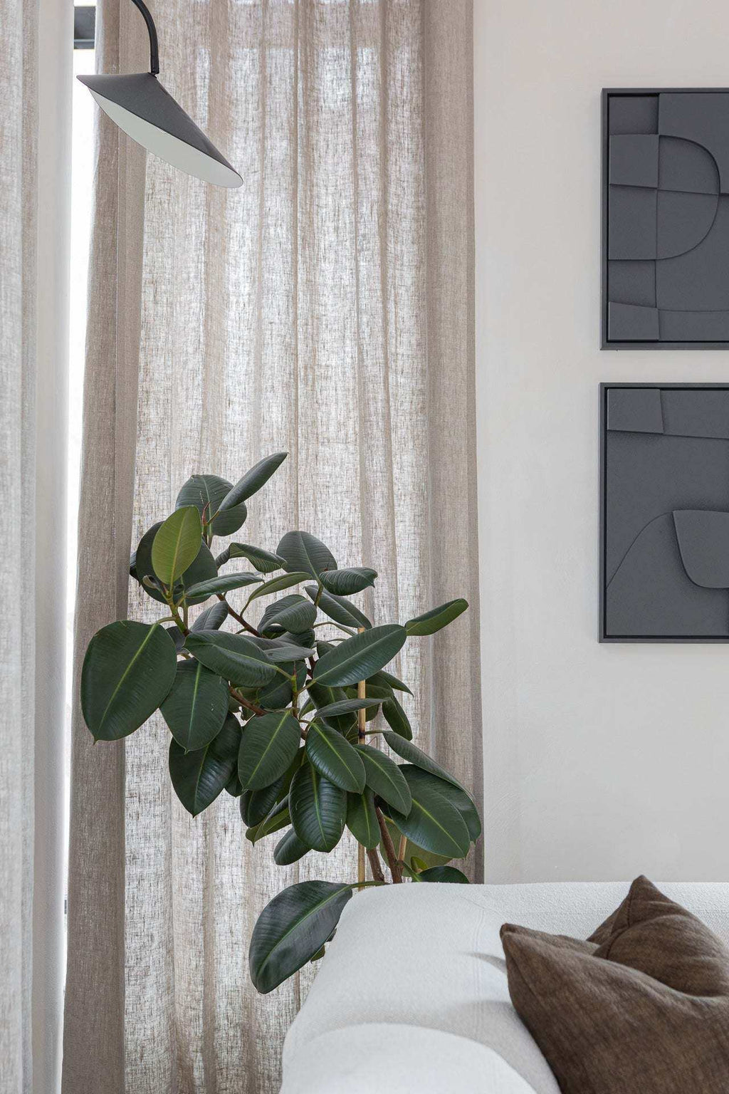 Quartet - Tête à Tête artwork displayed in a modern interior setting with a framed wall piece and potted plant.