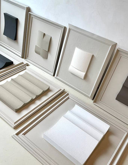 Vintage frame artworks by Edith Beurskens with sand texture and eco-paint, in mushroom and shadow white colors, 59 x 69 cm.