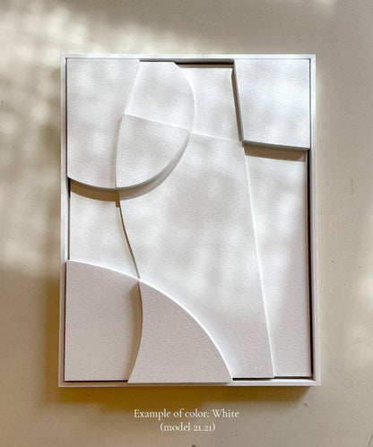 Eco-friendly white art piece made from plant-based PLA, featuring sand texture and geometric design.