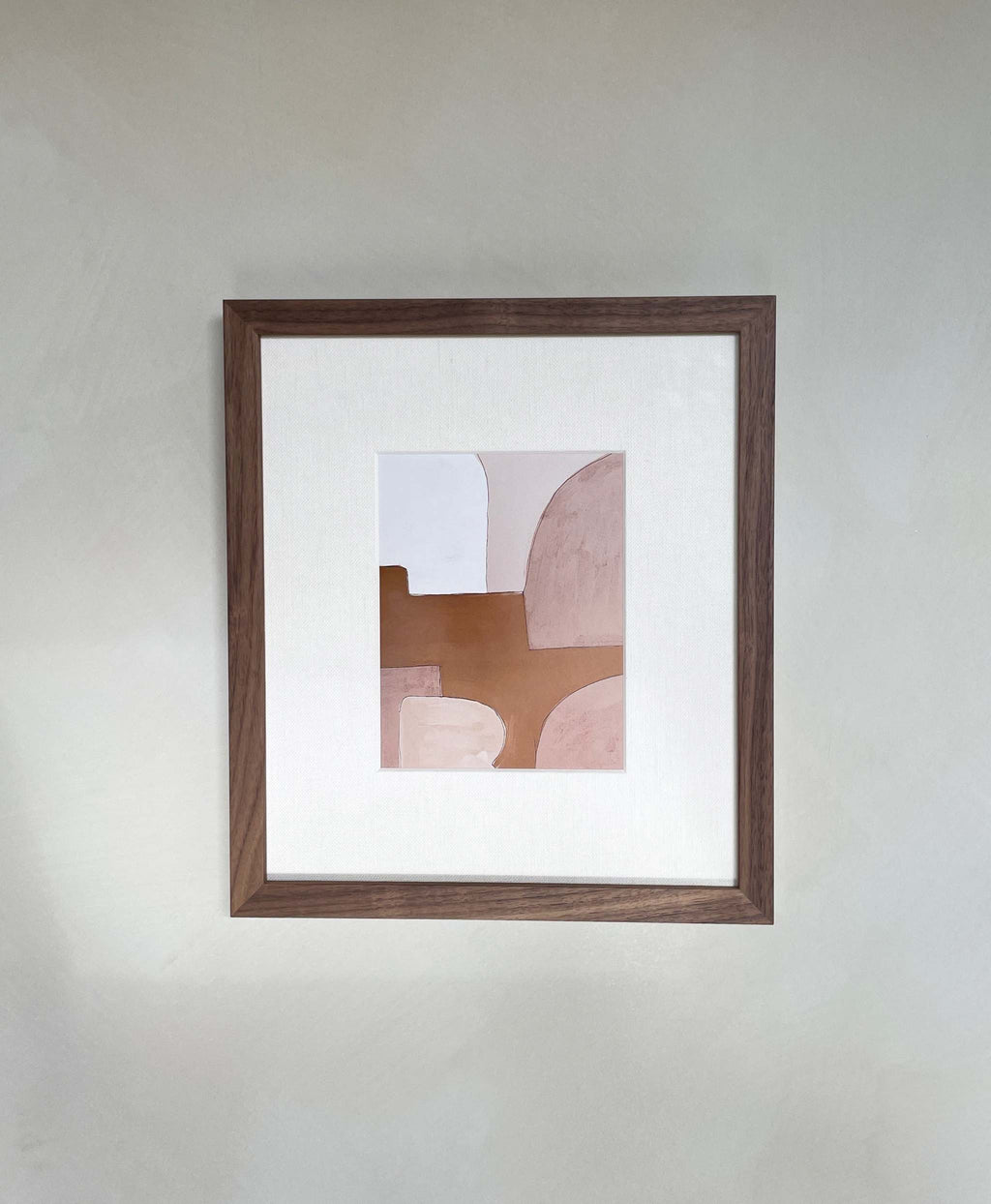 Modern abstract art print titled 'Rosie' in wooden frame, features warm earth tones on premium Hahnemühle paper.